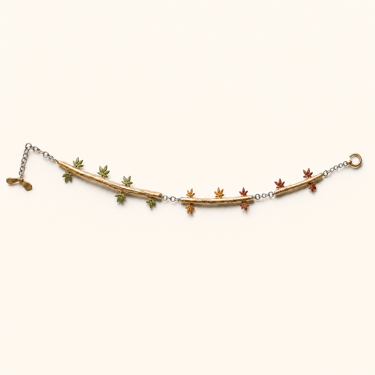 Autumn bracelet — gold bar with multicoloured maple leaf charms